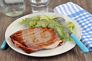 Croque-monsieur served on a plate with salad