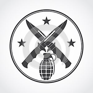 Crosed knives and grenade symbol