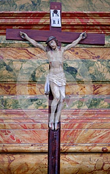 Cross on the altar in the church of Saint Leonard of Noblac in Kotari, Croatia