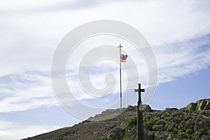 Cross and Armenian flag