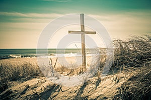 Cross on the beach in Ocean Grove, NJ, retro split tone