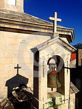 Cross and Bell, Church of Saint Justine in Korcula, Croatia