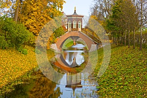 Cross bridge close-up in the autumn landscape. Tsarskoye Selo, St. Petersburg