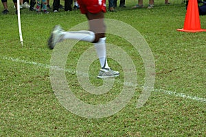 Cross Country Runner crossing the finish line