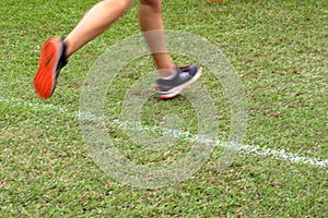 Cross Country Runner crossing the finish line