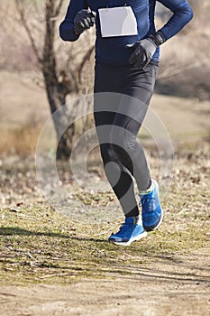 Cross country runner on a race. Active healthy lifestyle