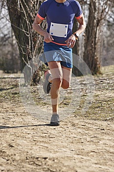 Cross country runner on a race. Active healthy lifestyle