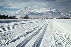 Cross-country skiing in Austria: Slope, fresh white powder snow and mountains