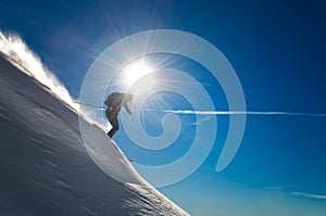 Cross country skiing during the descent in deep snow