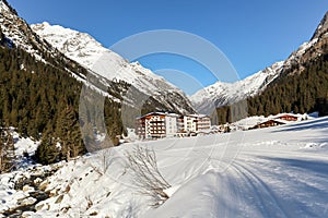 Cross-country skiing trail through the Pitztal near Sankt Leonhard in Tirol, winter sports in snowy landscape in the Austrian Alps