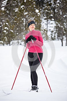 Cross-country skiing: young woman cross-country skiing