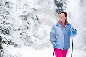 Cross-country skiing: young woman cross-country skiing