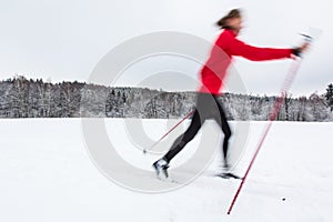 Cross-country skiing: young woman cross-country skiing