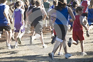 Cross Country Team Runners Leaving the Starting Line