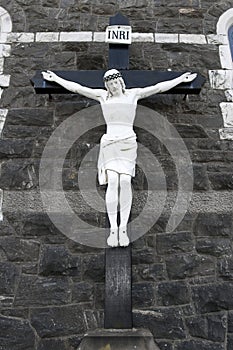 Cross of the crucifiction on a wall