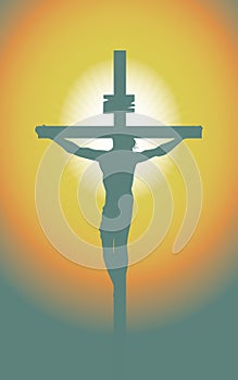 Cross with crucified Jesus Christ in the sunset