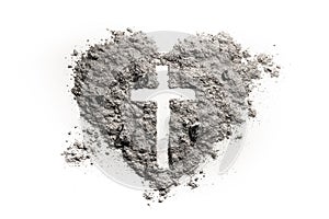 Cross or crucifix in heart symbol made of ash photo