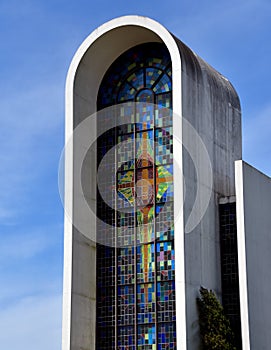 Cross Depicted in Front Window of Church