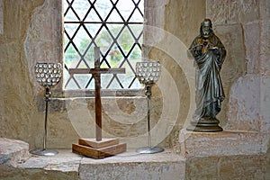 Cross , goblets and Jesus figurine