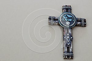 Cross on a grey background photo