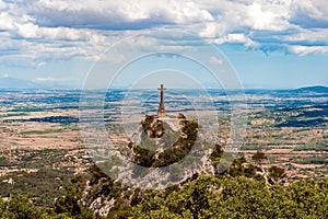 Cross on hill of cloister Santuari de Sant Salvador, Arta, Mallorca, Majorca, Spain