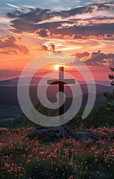Cross on the hill - symbol of crucifixion of Jesus Christ. On beautiful sunset background
