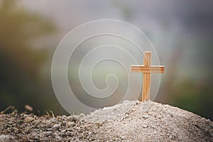 Cross on the hill To pray to God As the sun is setting higher religious concepts, the crucifixion of faith, faith in God, prayer,