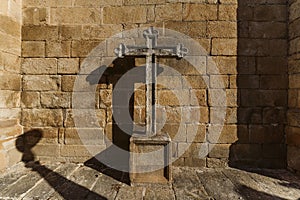 A cross in the historical Torre de Moncorvo Castle in Portugal photo