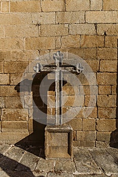 A cross in the historical Torre de Moncorvo Castle in Portugal photo