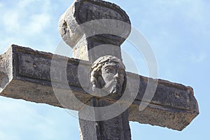 Christian cross with sculpture. City of cholula,  puebla. photo