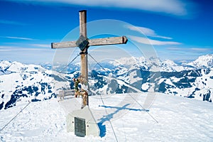 Cross and information pointer on top of the mountain Zinsberg