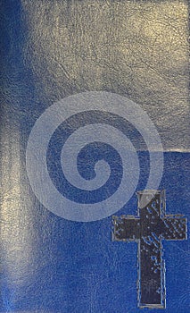 Cross of Jesus Christ with blue leather backround