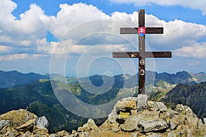 Cross on Krivan peak, Tatra Mountains, Slovakia, beautiful mountain landscape in Carpathians