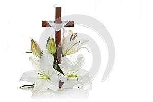 Cross with lilies isolated on white background for decorative design. Spring background. Easter card. photo