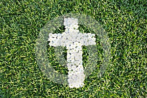 Cross made from daisy flowers