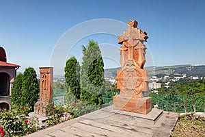 A cross made of stone-a Khachkar installed next to the church