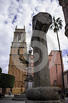 Cross outside the Parish of San Miguel ArcÃÂ¡ngel in San Miguel de Allende, Guanajuato, Mexico photo