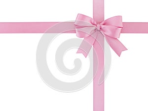 cross pastel pink ribbon bow wrapped corner packaging isolated on white background