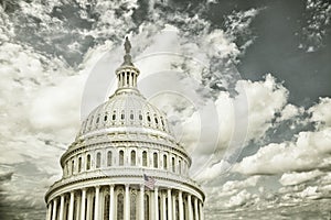 Cross processed US Capitol dome with clouds