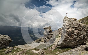 Cross in rock near Lac De Nino in Corsica photo