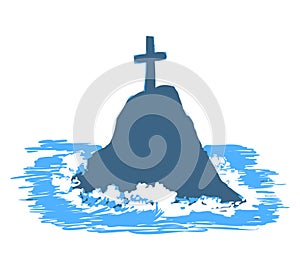 Cross on rock in the sea