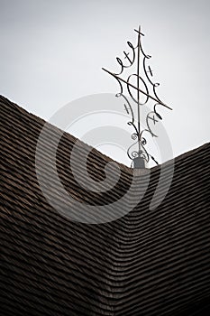 Cross on roof of wooden evangelical articular church in Kezmarok, Slovakia