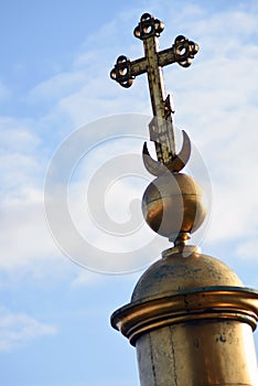 Cross of Saint Isaacs cathedral in Saint-Petersburg, Russia.