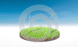 Cross section of green grass with wind turbine over blue sky background