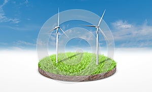 Cross section of green grass with wind turbine over blue sky background