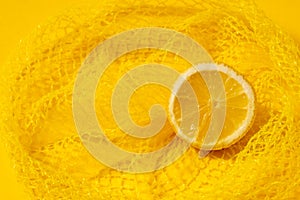 Cross section lemon yellow slice background close-up net netting packing package photo