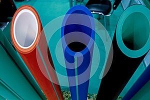Cross-section of multicolored large diameter plastic pipes