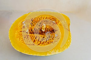 Kalabasa Cross Section With Fibrus Strands And Seeds photo