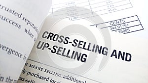 Cross selling word on book photo