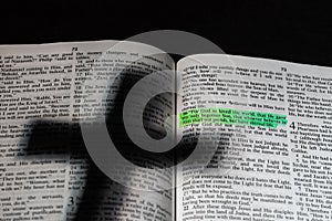 Cross Shadow On Open Bible